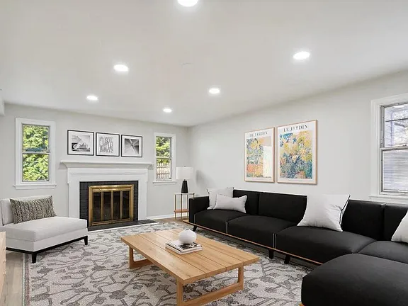 A newly furnished living room with clean and stylish amenities at a sober living in Philadelphia main line area.